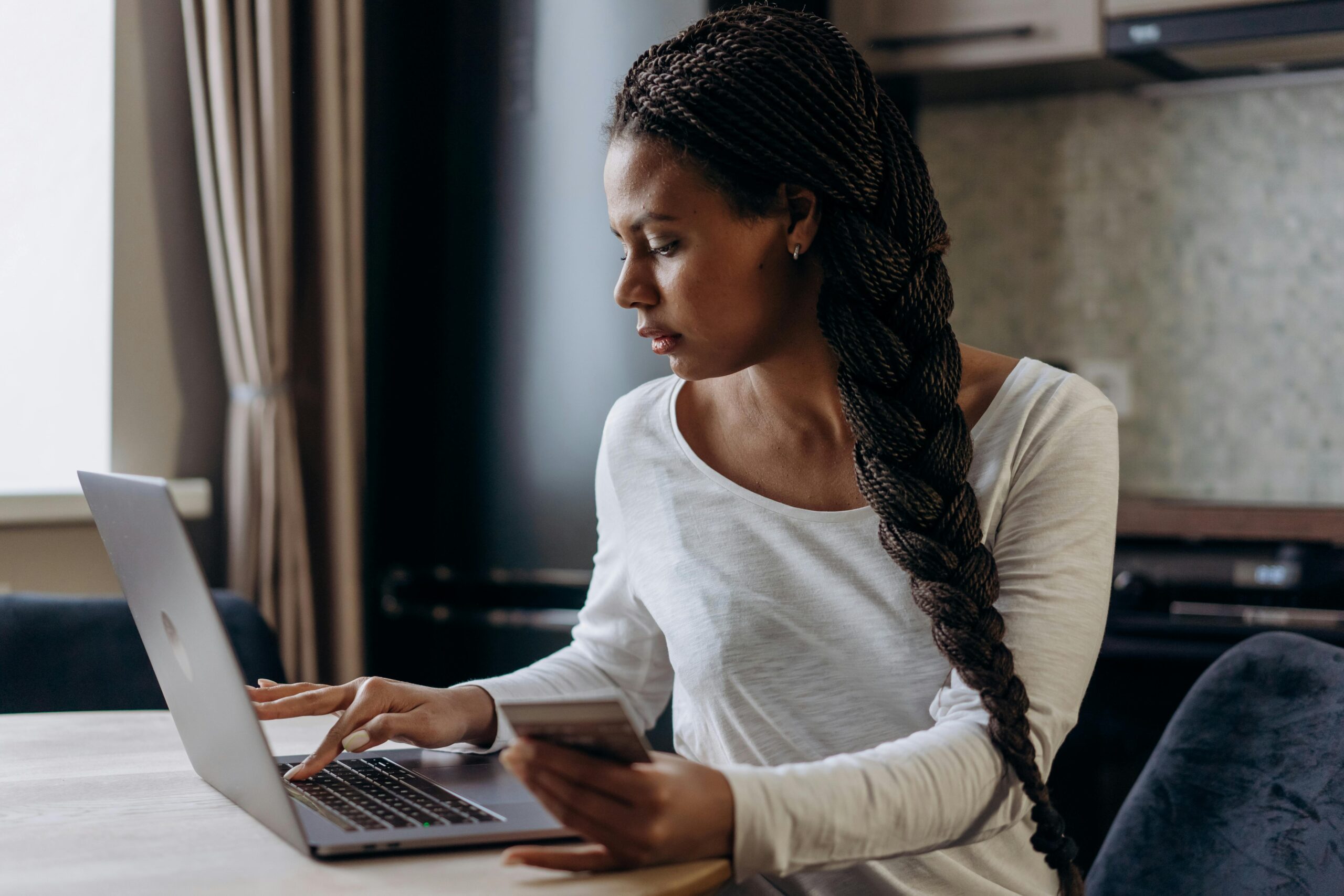 A Woman Using a Laptop